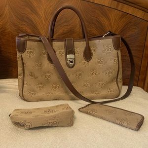 Authentic Vintage Dooney & Bourke signature crest canvas tote with leather trim